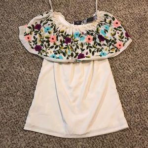 Off the shoulder dress.